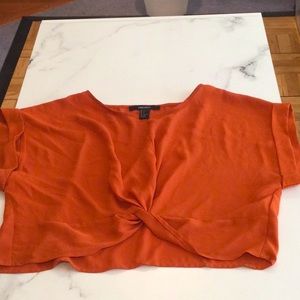 Forever 21 orange crop top, size small.